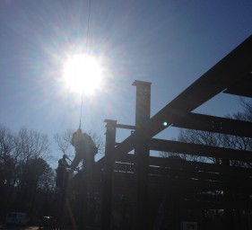 Steel workers at sunset